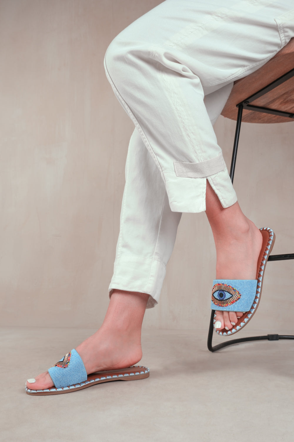 CLEANSE FLAT SANDALS WITH BEADED EYE DETAILING IN BABY BLUE