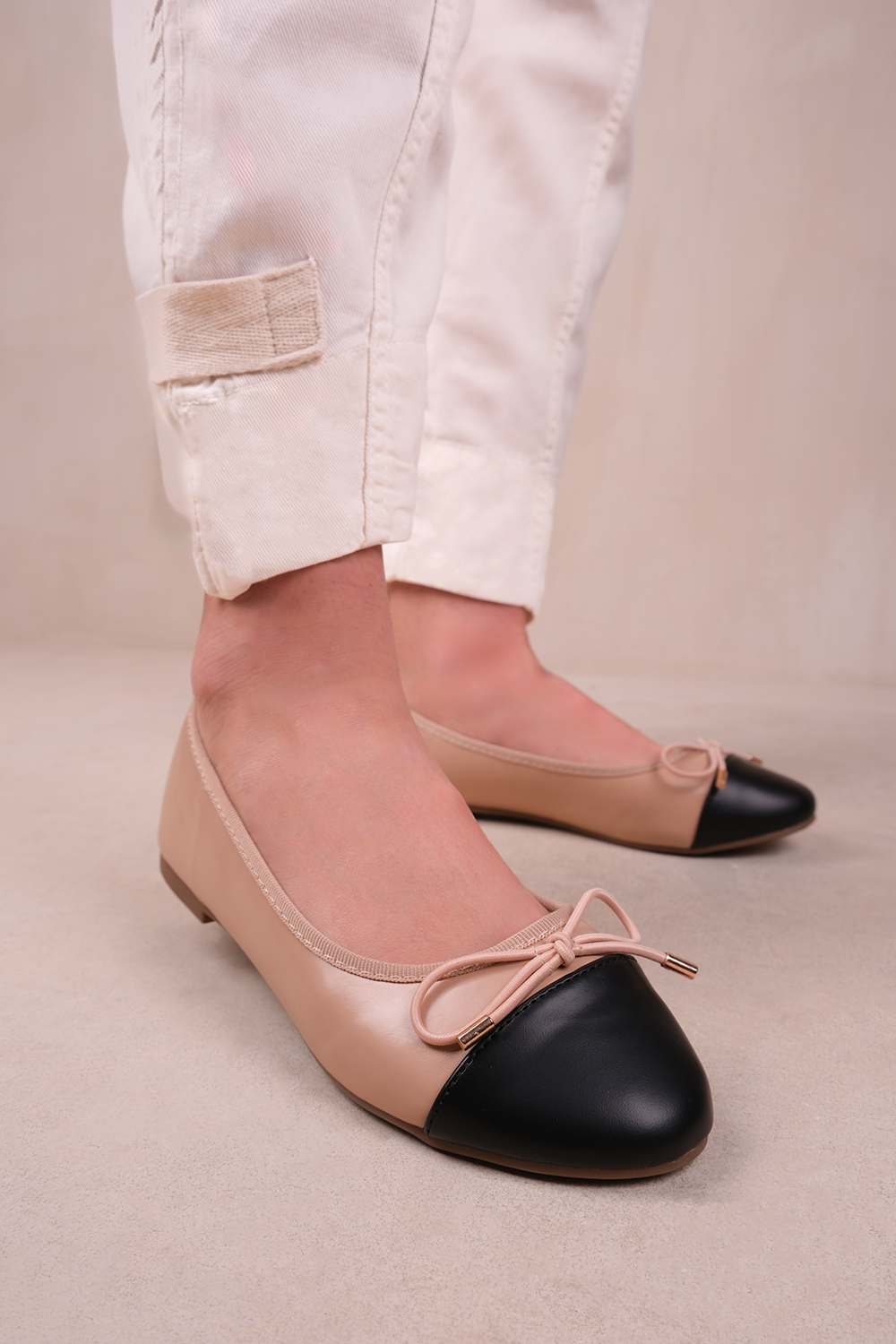 JANICE EXTRA WIDE BALLERINA FLATS WITH FRONT BOW DETAIL IN NUDE FAUX LEATHER