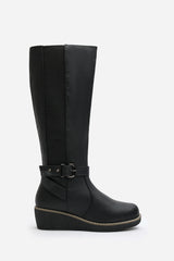 Oriana Wide Fit Black Faux Leather Knee High Wedge Boots With Strap And Buckle