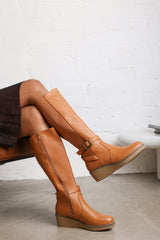 Oriana Wide Fit Tan Faux Leather Knee High Wedge Boots With Strap And Buckle