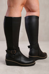 AYLEEN WIDE CALF WEDGE HEEL KNEE HIGH BOOTS WITH ELASTIC PANEL IN WIDE E FIT IN BLACK FAUX LEATHER