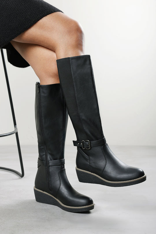 Jaxelle Black Knee High Wedge Heel Boots with Buckle Strap