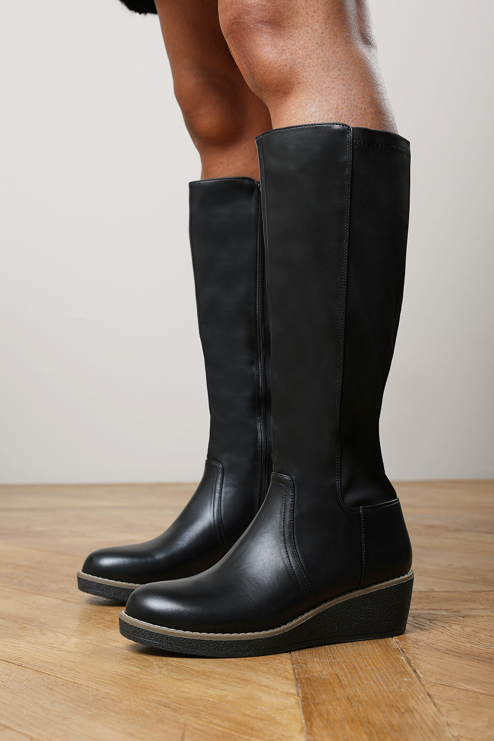 Kavira Black Knee High Wedge Heeled Boots with Stretch Calf Panel