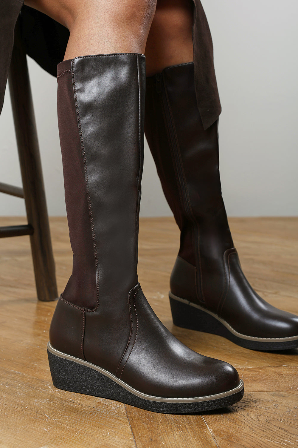 Kavira Brown Knee High Wedge Heeled Boots with Stretch Calf Panel