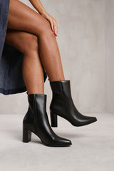 NORTH BLOCK HEEL ANKLE BOOT IN BLACK FAUX LEATHER