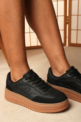 Xia Black Low Wedge Lace up trainer with leopard print heel detail