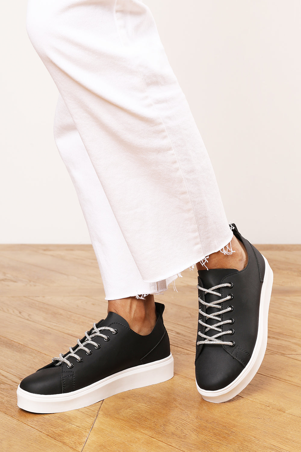 Eliane Black Low Wedge Trainer with Silver Lace up detail