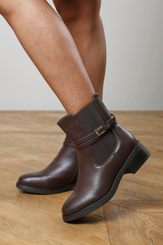 Haxine Brown Chelsea Flat Ankle Boot With Gold Buckle Detail