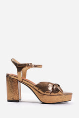 TALIA WIDE FIT MID BLOCK HEEL WITH PLAFTORM AND BOW DETAILING IN GOLD FAUX LEATHER