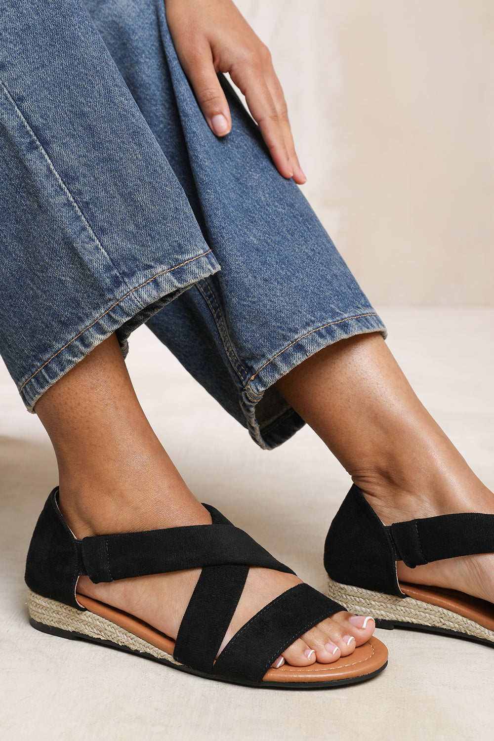 HUMMINGBIRD LOW WEDGE SHOES WITH CROSS OVER STRAP IN BLACK SUEDE