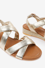 VIOLET WIDE FIT LOW WEDGE SHOES WITH BUCKLE CLOSURE & CROSS OVER STRAP IN GOLD METALLIC FAUX LEATHER