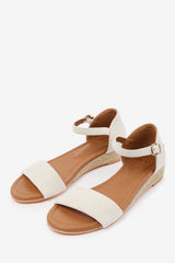 ELEANOR LOW WEDGE SHOES WITH ADJUSTABLE ANKLE STRAP IN CREAM SUEDE