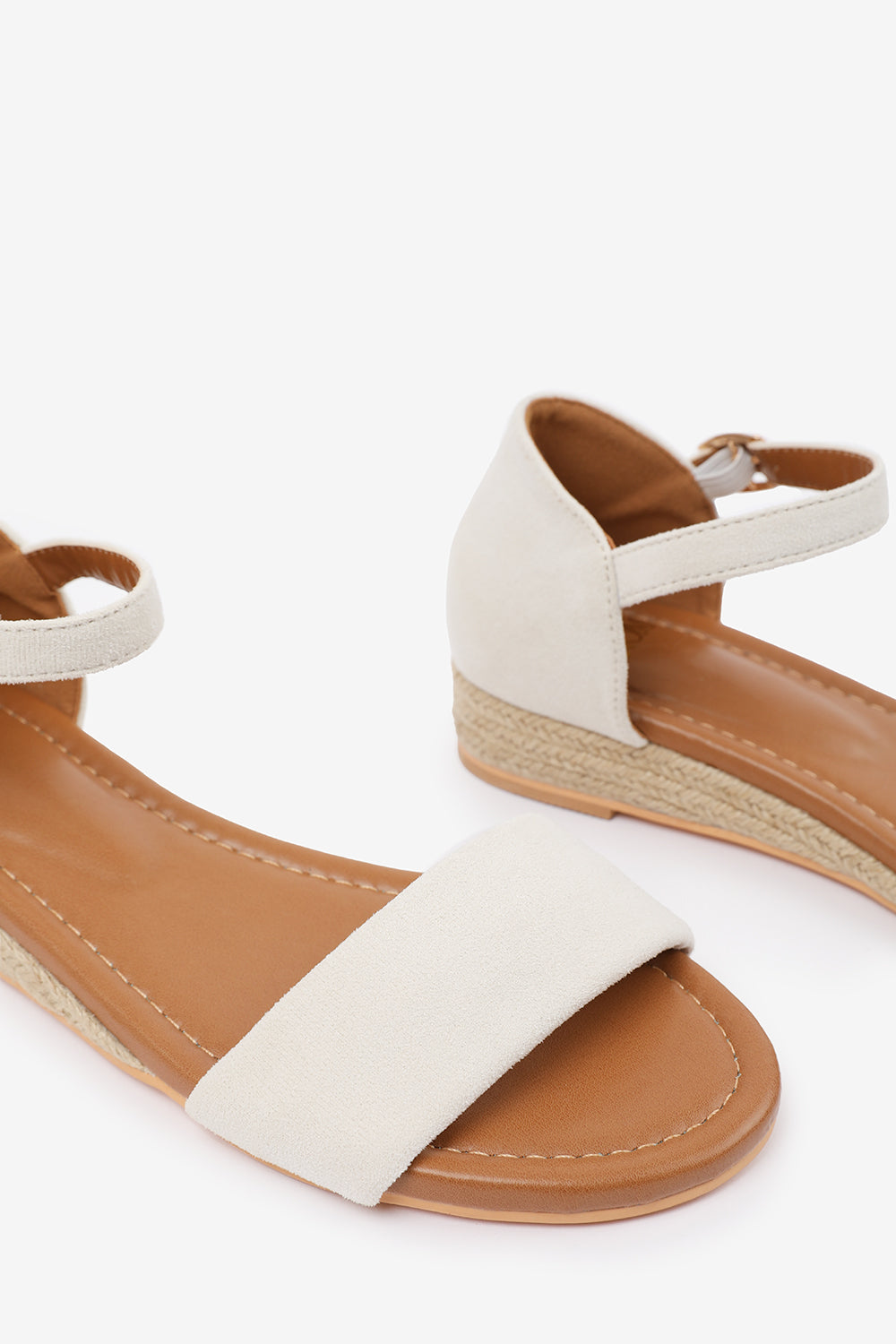 ELEANOR LOW WEDGE SHOES WITH ADJUSTABLE ANKLE STRAP IN CREAM SUEDE