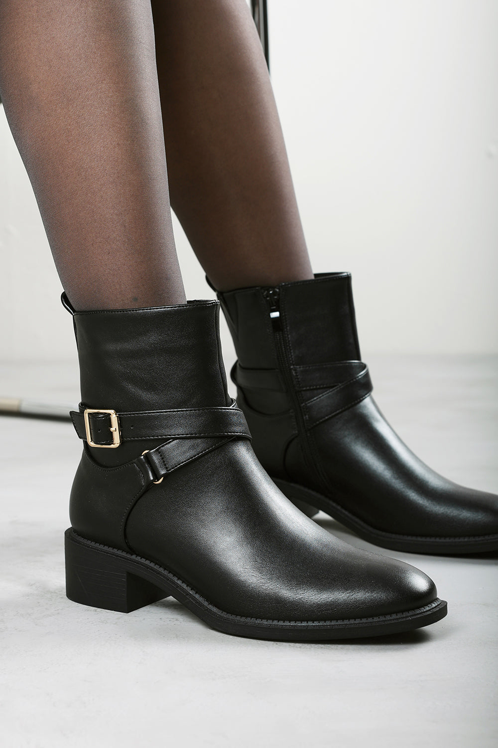 Elvara Black Low Block Heel Ankle Boot With Strap Detail