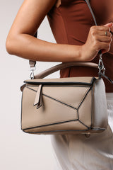 Abrazo Geometric Top Handle Bag in Taupe