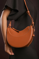 Envie Crescent Faux Leather Shoulder Bag in Tan