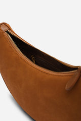 Pebble Modern Half Moon Shoulder Bag In Cognac