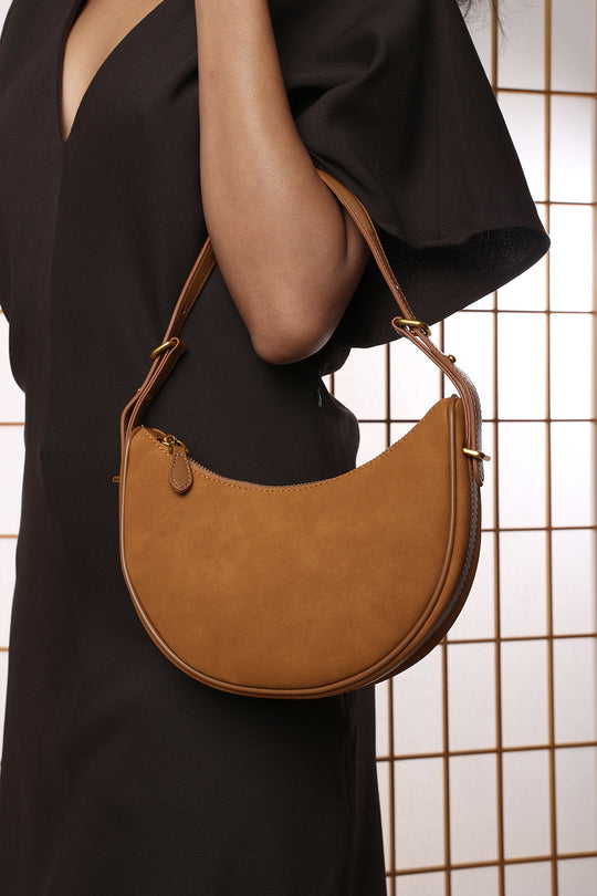 Pebble Modern Half Moon Shoulder Bag In Cognac