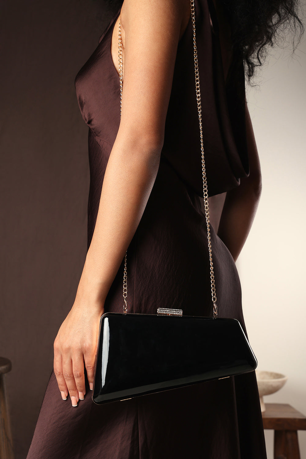 Lark Asymmetric Black Metallic Clutch Bag