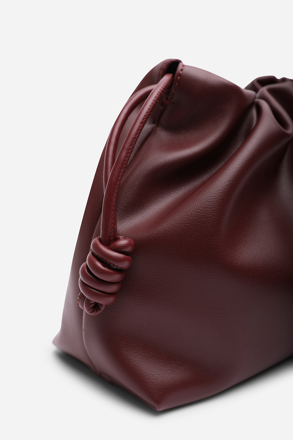 Auric Drawstring Shoulder Bag In Maroon
