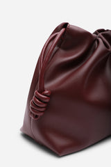 Auric Drawstring Shoulder Bag In Maroon