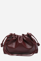 Auric Drawstring Shoulder Bag In Maroon