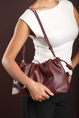Auric Drawstring Shoulder Bag In Maroon