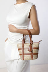 Alaia Small Raffia Bag with Studd Detail and Cross Body Strap in Tan