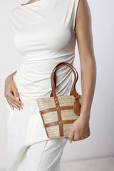 Alaia Small Raffia Bag with Studd Detail and Cross Body Strap in Tan
