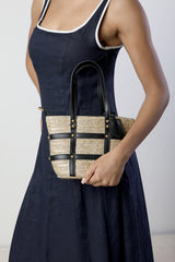 Alaia Small Raffia Bag with Studd Detail and Cross Body Strap in Black