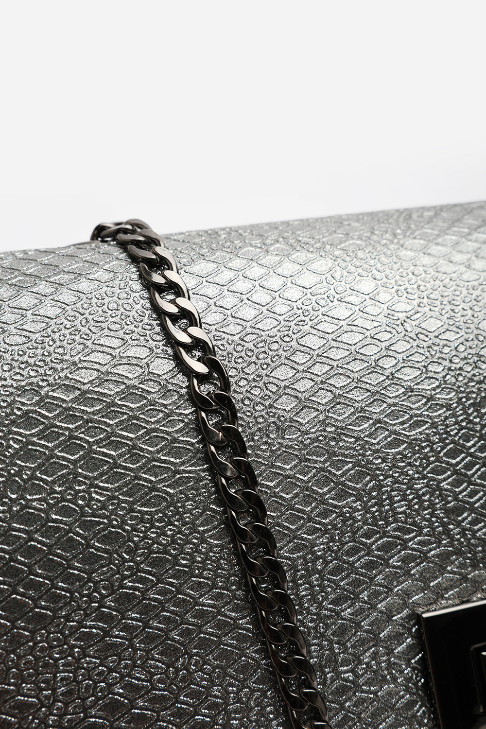 Lurexa Silver Metalic Snake Clutch & Crossbody Bag With Twist Lock Detail and Chain