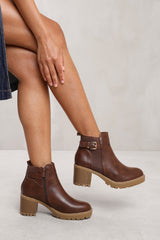 KALI MID BLOCK HEEL WITH BUCKLE DETAIL STRETCH ANKLE BOOTS IN BROWN FAUX LEATHER