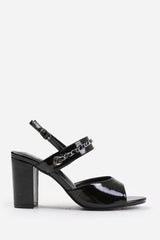 AUDRA MID BLOCK HEELS WITH CHAIN DETAILING IN BLACK PATENT