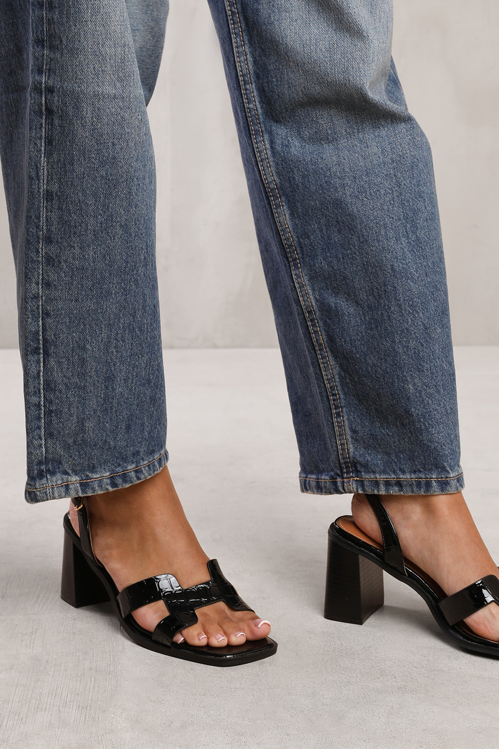 ILLINOIS CROSS OVER MULTI STRAP HEELS IN BLACK FAUX LEATHER