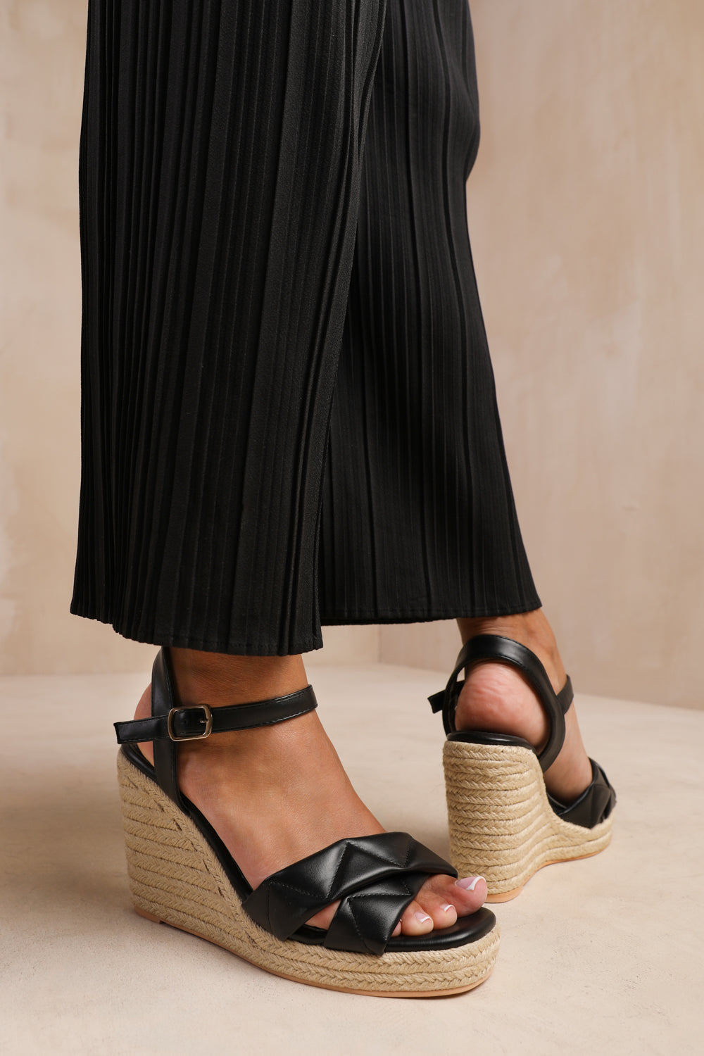 LIMA PADDED CROSS OVER STRAP ESPADRILLE WEDGES IN BLACK FAUX LEATHER