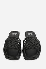Anastasia Woven Strap Flat Sandals In Black
