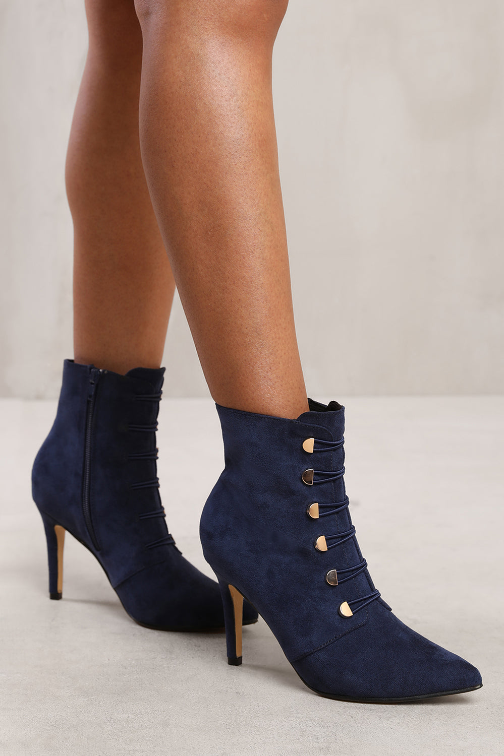 TILDA POINTED TOE MID HEEL ANKLE BOOTS WITH GOLD BUTTONS IN NAVY