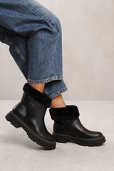 PEYTON ANKLE BOOT WITH FUR LINING IN BLACK FAUX LEATHER