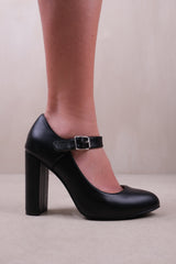 MICHELLE BLOCK HIGH HEEL PUMP WITH FRONT BUCKLE STRAP IN BLACK FAUX LEATHER