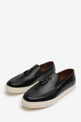 OLIVER SLIP ON TASSEL LOAFERS IN BLACK