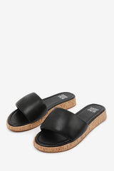 JULIA WIDE FIT FLATFORM SLIDERS SANDAL IN BLACK FAUX LEATHER