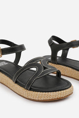 SOFIA WIDE FIT FLATFORM SANDAL WITH STYLISH CUT STRAP DETAIL IN BLACK FAUX LEATHER