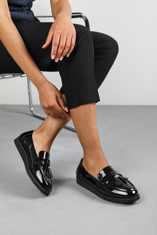 Kennedy Wide Fit Tasseled Loafers in Black Patent Finish