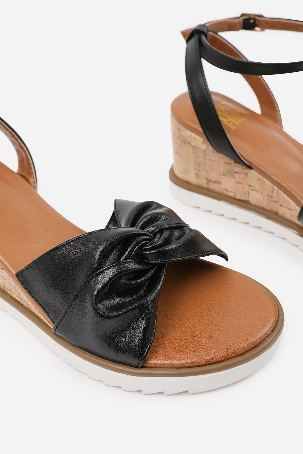 KATARA KNOT DETAIL WEDGE SHOES WITH BUCKLE ANKLE STRAP IN BLACK PU