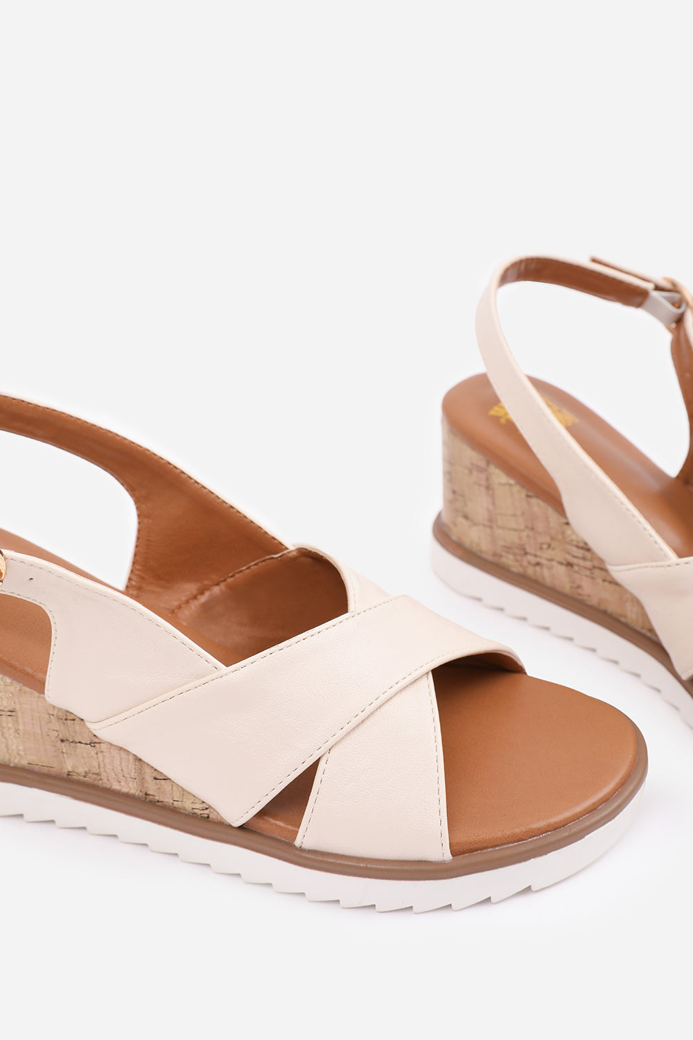 QWEEN CROSS OVER STRAP DETAIL WEDGE SHOES WITH BUCKLE CLOSURE IN CREAM PU