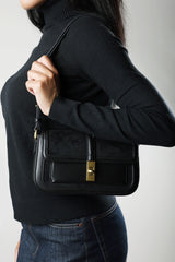 Helyra Black Shoulder Bag with Gold Detail Twist Lock Closure