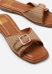 VERMONT FRONT BUCKLE RAFFIA SLIDERS IN TAN FAUX LEATHER