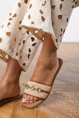 Callie Tan Flat Sandals With Pearl And Gold Chain Embellishment