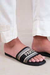 CANDOUR TEXTILE STRAP SLIP ON SANDALS IN BLACK FAUX LEATHER