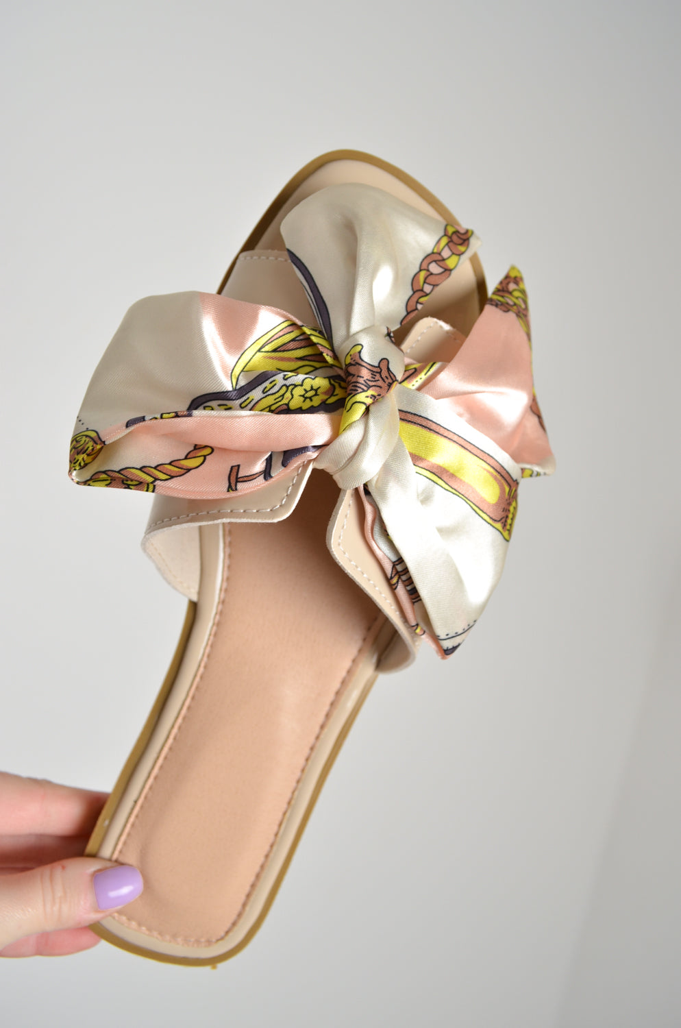 AZURE SLIDER SANDALS WITH SCARF PRINT BOW DETAIL IN NUDE PATENT